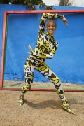 Adwoa Aboah in a graffiti-print bodysuit and leggings c Courtesy of Burberry_Juergen Teller