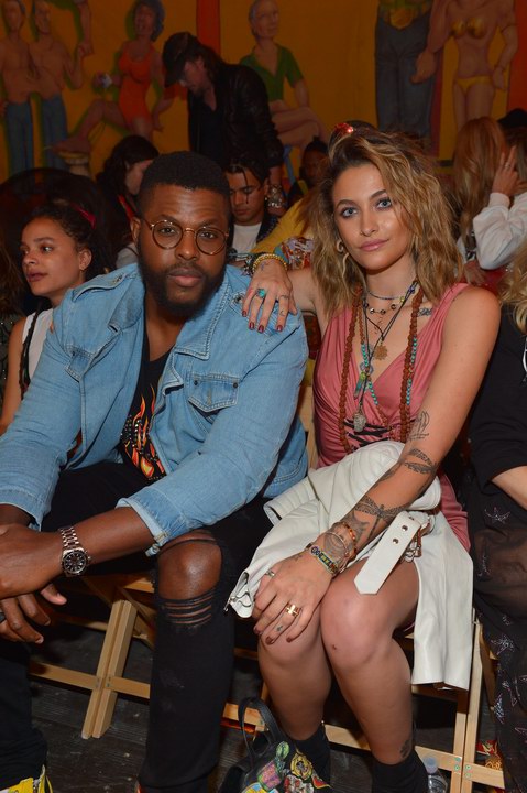 Winston Duke, Paris Jackson attends the Moschino Spring/Summer 19 Menswear and Women's Resort Collection at Los Angeles Equestrian Center on June 8, 2018 in Burbank, California.