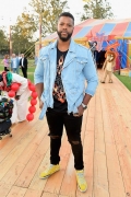 Winston Duke attends the Moschino Spring/Summer 19 Menswear and Women's Resort Collection at Los Angeles Equestrian Center on June 8, 2018 in Burbank, California.