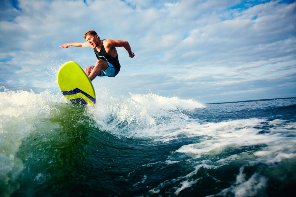 Surfing - Gympass: 5 attività dentro e fuori dall’acqua per se